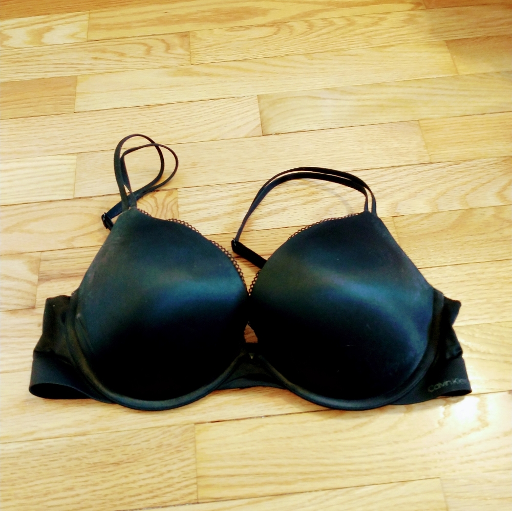 Calvin Klein black push up bra in 34D with cute double straps. Some deodorant m